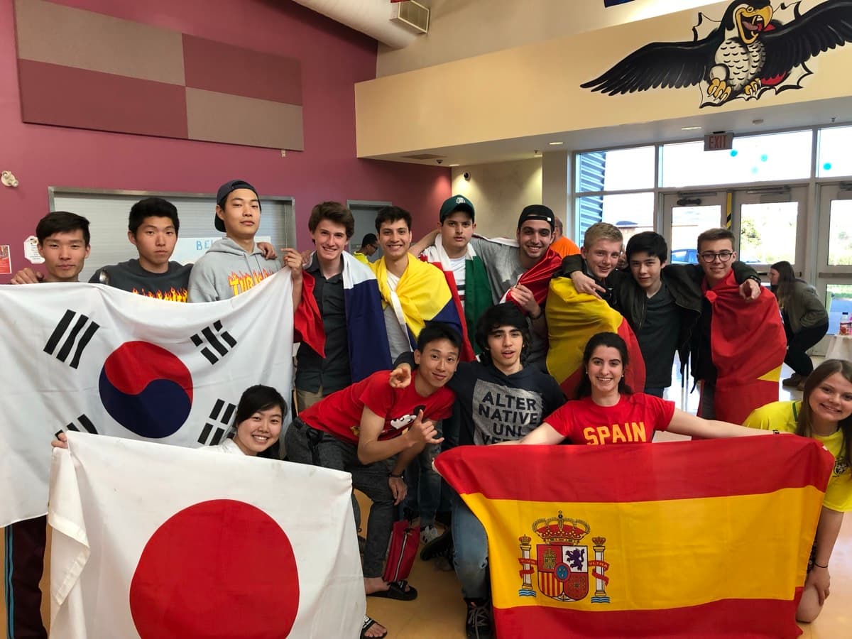 International students with flags from different countries
